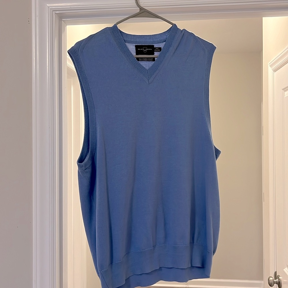 Black, brown golf vest